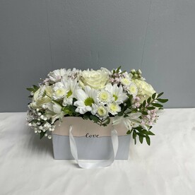 Цветы в сумке Лав