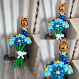 Букет из воздушных ромашек с мини фигурой